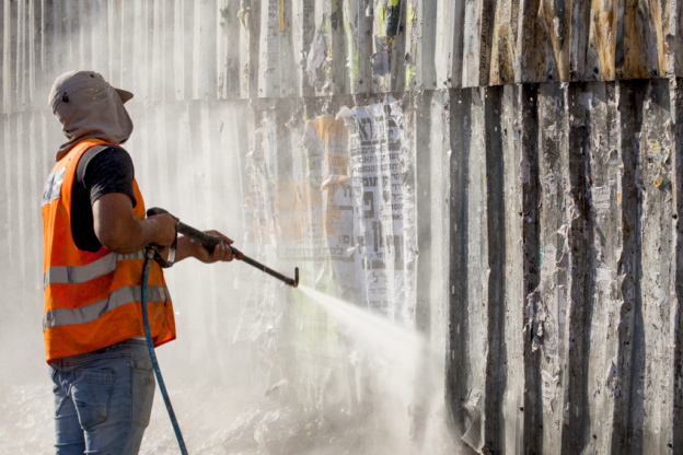 Man with pressure washer